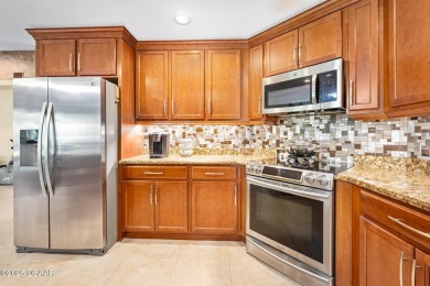CAR COLLECTORS DREAM...This stunning, well-maintained, 3 bedroom on Halifax Plantation Golf Club in Florida - for sale on GolfHomes.com, golf home, golf lot