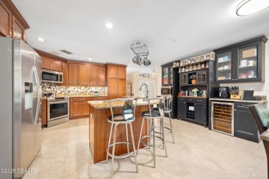 CAR COLLECTORS DREAM...This stunning, well-maintained, 3 bedroom on Halifax Plantation Golf Club in Florida - for sale on GolfHomes.com, golf home, golf lot