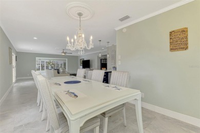 This stunning 3-bedroom, 2-bathroom lakefront home in the highly on Boca Royale Golf and Country Club in Florida - for sale on GolfHomes.com, golf home, golf lot