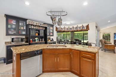 CAR COLLECTORS DREAM...This stunning, well-maintained, 3 bedroom on Halifax Plantation Golf Club in Florida - for sale on GolfHomes.com, golf home, golf lot