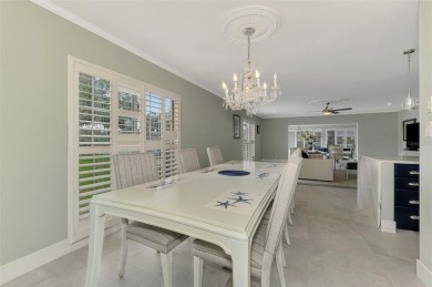 This stunning 3-bedroom, 2-bathroom lakefront home in the highly on Boca Royale Golf and Country Club in Florida - for sale on GolfHomes.com, golf home, golf lot