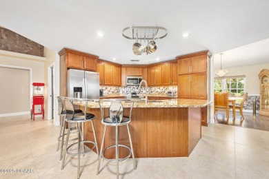 CAR COLLECTORS DREAM...This stunning, well-maintained, 3 bedroom on Halifax Plantation Golf Club in Florida - for sale on GolfHomes.com, golf home, golf lot