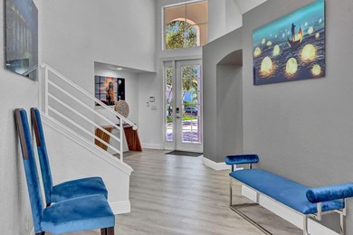 GREAT VALUE!  This light & open 2-story home of 3 bedrooms & 2 on Woodfield Country Club in Florida - for sale on GolfHomes.com, golf home, golf lot