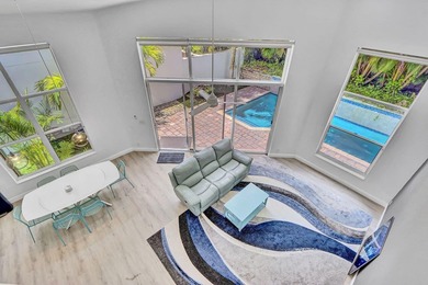 GREAT VALUE!  This light & open 2-story home of 3 bedrooms & 2 on Woodfield Country Club in Florida - for sale on GolfHomes.com, golf home, golf lot