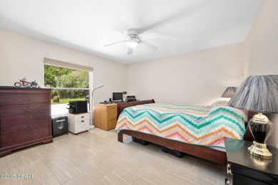 CAR COLLECTORS DREAM...This stunning, well-maintained, 3 bedroom on Halifax Plantation Golf Club in Florida - for sale on GolfHomes.com, golf home, golf lot