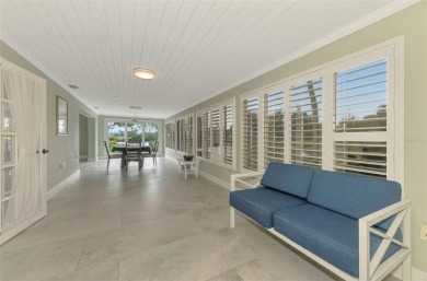 This stunning 3-bedroom, 2-bathroom lakefront home in the highly on Boca Royale Golf and Country Club in Florida - for sale on GolfHomes.com, golf home, golf lot