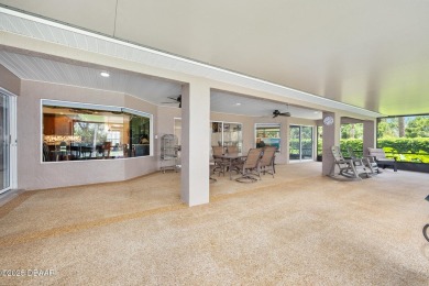 CAR COLLECTORS DREAM...This stunning, well-maintained, 3 bedroom on Halifax Plantation Golf Club in Florida - for sale on GolfHomes.com, golf home, golf lot