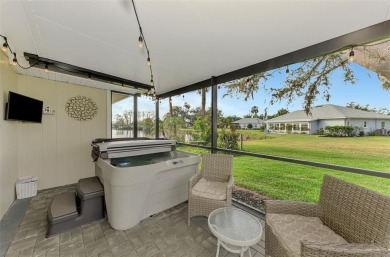 This stunning 3-bedroom, 2-bathroom lakefront home in the highly on Boca Royale Golf and Country Club in Florida - for sale on GolfHomes.com, golf home, golf lot