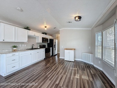 NO LOT RENT, it is a deeded lot, 2 bedrooms 1 Bath. A/C 2018 and on Glen Lakes Country Club in Florida - for sale on GolfHomes.com, golf home, golf lot