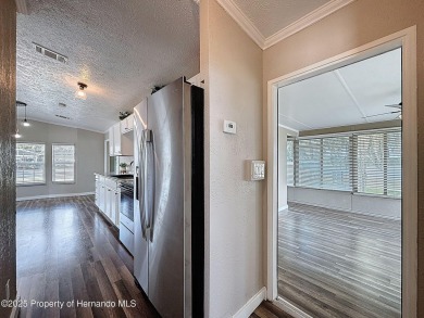 NO LOT RENT, it is a deeded lot, 2 bedrooms 1 Bath. A/C 2018 and on Glen Lakes Country Club in Florida - for sale on GolfHomes.com, golf home, golf lot