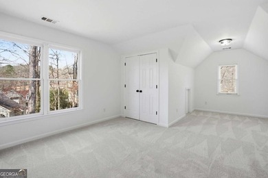 Welcome to this exceptional brick estate in the highly desirable on Towne Lake Hills Golf Club in Georgia - for sale on GolfHomes.com, golf home, golf lot