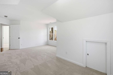 Welcome to this exceptional brick estate in the highly desirable on Towne Lake Hills Golf Club in Georgia - for sale on GolfHomes.com, golf home, golf lot