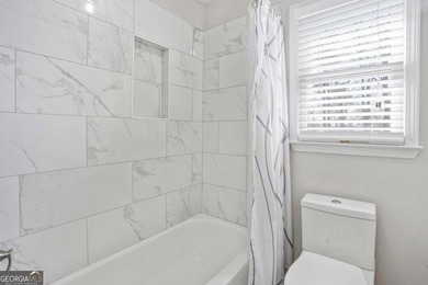 Welcome to this exceptional brick estate in the highly desirable on Towne Lake Hills Golf Club in Georgia - for sale on GolfHomes.com, golf home, golf lot