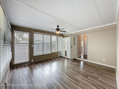 NO LOT RENT, it is a deeded lot, 2 bedrooms 1 Bath. A/C 2018 and on Glen Lakes Country Club in Florida - for sale on GolfHomes.com, golf home, golf lot