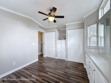 NO LOT RENT, it is a deeded lot, 2 bedrooms 1 Bath. A/C 2018 and on Glen Lakes Country Club in Florida - for sale on GolfHomes.com, golf home, golf lot