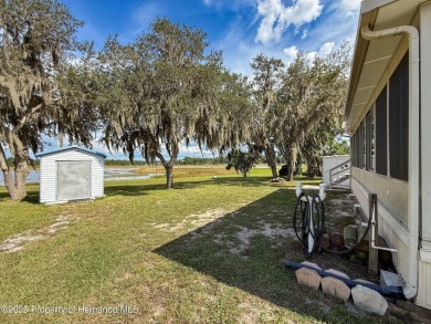 NO LOT RENT, it is a deeded lot, 2 bedrooms 1 Bath. A/C 2018 and on Glen Lakes Country Club in Florida - for sale on GolfHomes.com, golf home, golf lot