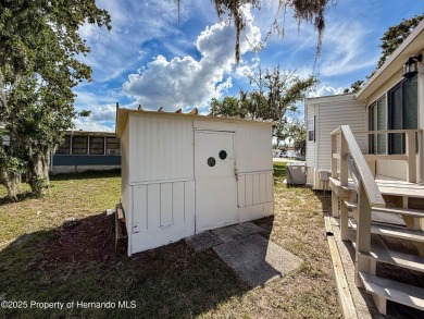 NO LOT RENT, it is a deeded lot, 2 bedrooms 1 Bath. A/C 2018 and on Glen Lakes Country Club in Florida - for sale on GolfHomes.com, golf home, golf lot