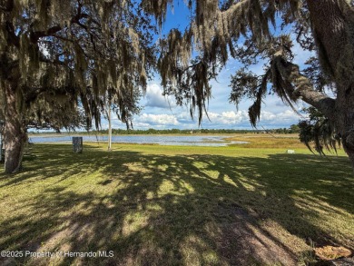 NO LOT RENT, it is a deeded lot, 2 bedrooms 1 Bath. A/C 2018 and on Glen Lakes Country Club in Florida - for sale on GolfHomes.com, golf home, golf lot