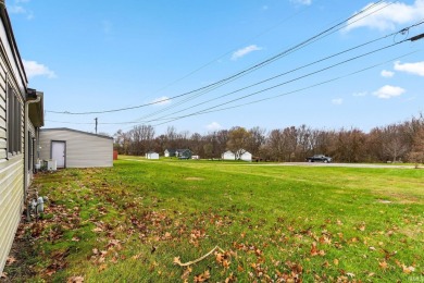 This 3-bedroom, 2.5-bath ranch home is ideally located across on Rozella Ford Golf Club in Indiana - for sale on GolfHomes.com, golf home, golf lot