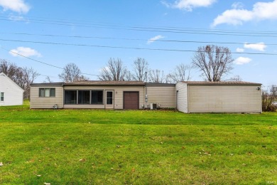 This 3-bedroom, 2.5-bath ranch home is ideally located across on Rozella Ford Golf Club in Indiana - for sale on GolfHomes.com, golf home, golf lot