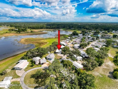 NO LOT RENT, it is a deeded lot, 2 bedrooms 1 Bath. A/C 2018 and on Glen Lakes Country Club in Florida - for sale on GolfHomes.com, golf home, golf lot
