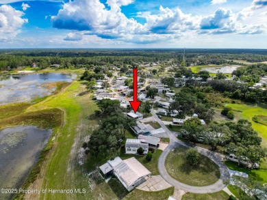 NO LOT RENT, it is a deeded lot, 2 bedrooms 1 Bath. A/C 2018 and on Glen Lakes Country Club in Florida - for sale on GolfHomes.com, golf home, golf lot