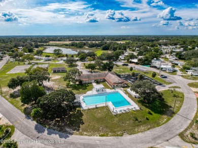 NO LOT RENT, it is a deeded lot, 2 bedrooms 1 Bath. A/C 2018 and on Glen Lakes Country Club in Florida - for sale on GolfHomes.com, golf home, golf lot