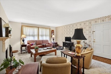 Enjoy effortless living with stunning golf course setting in on Saint Clair Country Club in Illinois - for sale on GolfHomes.com, golf home, golf lot