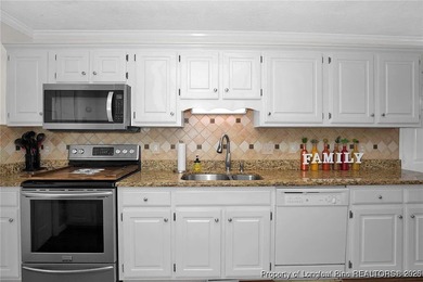 This well-kept 4-bedroom, 3.5-bath home in the desirable Baywood on Baywood Golf Club in North Carolina - for sale on GolfHomes.com, golf home, golf lot