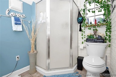 This well-kept 4-bedroom, 3.5-bath home in the desirable Baywood on Baywood Golf Club in North Carolina - for sale on GolfHomes.com, golf home, golf lot