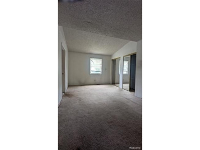 MOTIVATED SELLER! Three-bedroom, 2 full baths ranch. Located on The Links At Crystal Lake in Michigan - for sale on GolfHomes.com, golf home, golf lot
