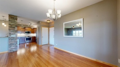 Looking for a top floor condo with priceless views of woods on Blue Top Ridge At Riverside in Iowa - for sale on GolfHomes.com, golf home, golf lot