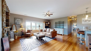 Looking for a top floor condo with priceless views of woods on Blue Top Ridge At Riverside in Iowa - for sale on GolfHomes.com, golf home, golf lot