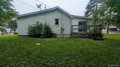MOTIVATED SELLER! Three-bedroom, 2 full baths ranch. Located on The Links At Crystal Lake in Michigan - for sale on GolfHomes.com, golf home, golf lot