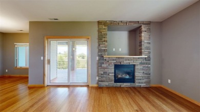 Looking for a top floor condo with priceless views of woods on Blue Top Ridge At Riverside in Iowa - for sale on GolfHomes.com, golf home, golf lot
