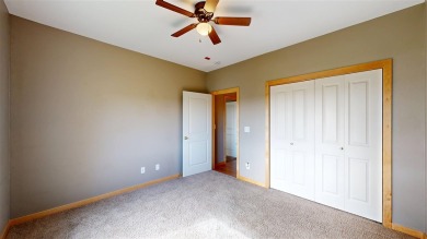 Looking for a top floor condo with priceless views of woods on Blue Top Ridge At Riverside in Iowa - for sale on GolfHomes.com, golf home, golf lot