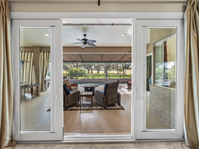 Discover your personal oasis in this stunning 4-bedroom on River Wilderness Golf and Country Club in Florida - for sale on GolfHomes.com, golf home, golf lot