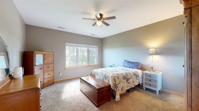 Looking for a top floor condo with priceless views of woods on Blue Top Ridge At Riverside in Iowa - for sale on GolfHomes.com, golf home, golf lot