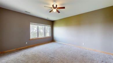 Looking for a top floor condo with priceless views of woods on Blue Top Ridge At Riverside in Iowa - for sale on GolfHomes.com, golf home, golf lot