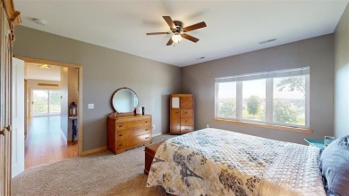 Looking for a top floor condo with priceless views of woods on Blue Top Ridge At Riverside in Iowa - for sale on GolfHomes.com, golf home, golf lot