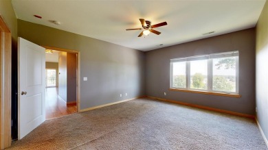 Looking for a top floor condo with priceless views of woods on Blue Top Ridge At Riverside in Iowa - for sale on GolfHomes.com, golf home, golf lot