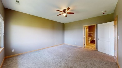 Looking for a top floor condo with priceless views of woods on Blue Top Ridge At Riverside in Iowa - for sale on GolfHomes.com, golf home, golf lot