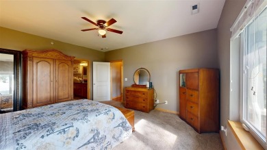 Looking for a top floor condo with priceless views of woods on Blue Top Ridge At Riverside in Iowa - for sale on GolfHomes.com, golf home, golf lot