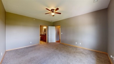 Looking for a top floor condo with priceless views of woods on Blue Top Ridge At Riverside in Iowa - for sale on GolfHomes.com, golf home, golf lot
