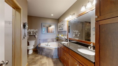 Looking for a top floor condo with priceless views of woods on Blue Top Ridge At Riverside in Iowa - for sale on GolfHomes.com, golf home, golf lot
