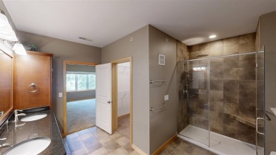 Looking for a top floor condo with priceless views of woods on Blue Top Ridge At Riverside in Iowa - for sale on GolfHomes.com, golf home, golf lot