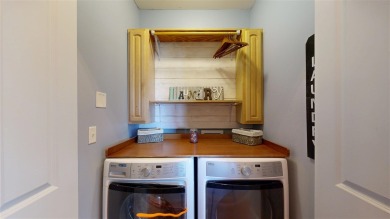 Looking for a top floor condo with priceless views of woods on Blue Top Ridge At Riverside in Iowa - for sale on GolfHomes.com, golf home, golf lot