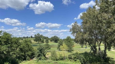 Looking for a top floor condo with priceless views of woods on Blue Top Ridge At Riverside in Iowa - for sale on GolfHomes.com, golf home, golf lot