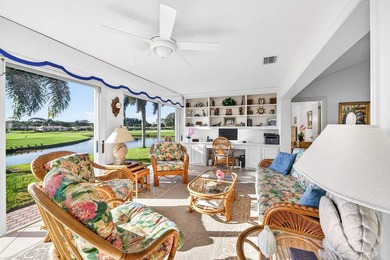 Beautiful villa with sweeping lake and golf course views on Quail Ridge Golf Course and Country Club in Florida - for sale on GolfHomes.com, golf home, golf lot