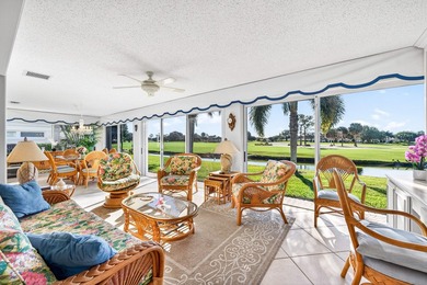 Beautiful villa with sweeping lake and golf course views on Quail Ridge Golf Course and Country Club in Florida - for sale on GolfHomes.com, golf home, golf lot